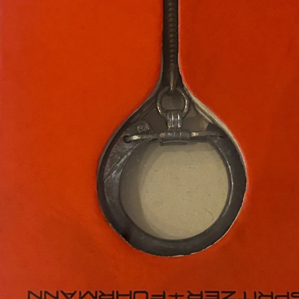 Key Chain featuring a 1943 Curaçao 5 cents coin set in a metal holder